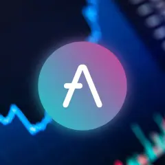 Das AAVE Coin-Logo leuchtet vor einem unscharfen Hintergrund mit einem blauen Diagramm, das den Markt widerspiegelt.