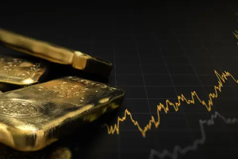 Goldbarren liegen auf einem Diagramm, das den Aufwärtstrend des Goldpreises zeigt. Ein visueller Leitfaden, wie investiere ich in gold.